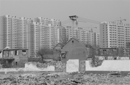 城鎮(zhèn)化成地方兩會熱議話題農(nóng)民住樓更需融入城市